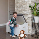 Coffre à jouets blanc avec coussin gris