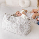 Quilted Diaper Bag with Changing Pad – Leaves in use