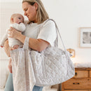 Quilted Diaper Bag with Changing Pad – Spring (floral) in use