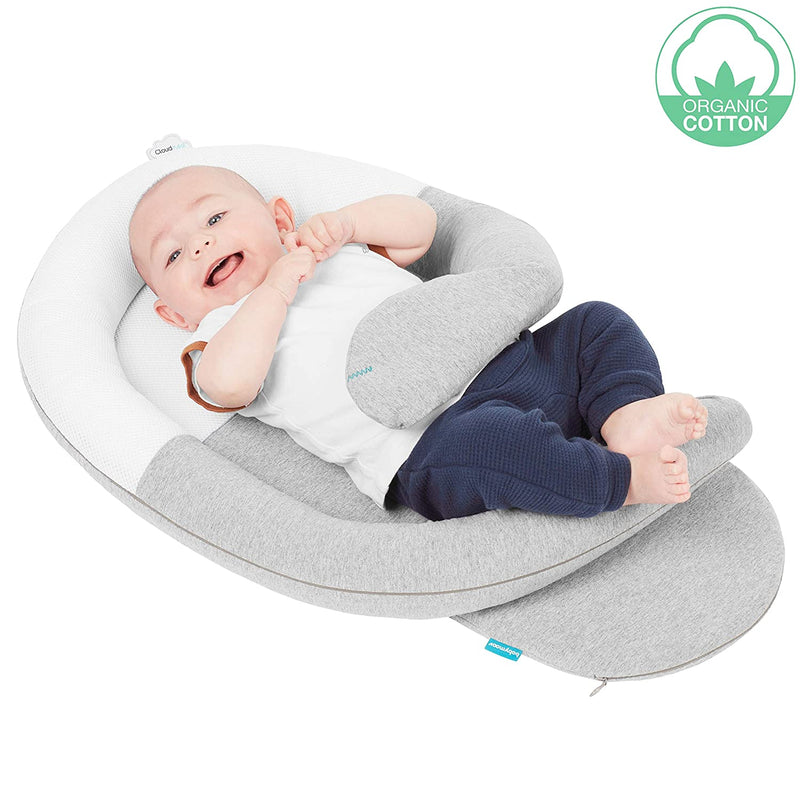 Baby sleeping in boppy lounger shop